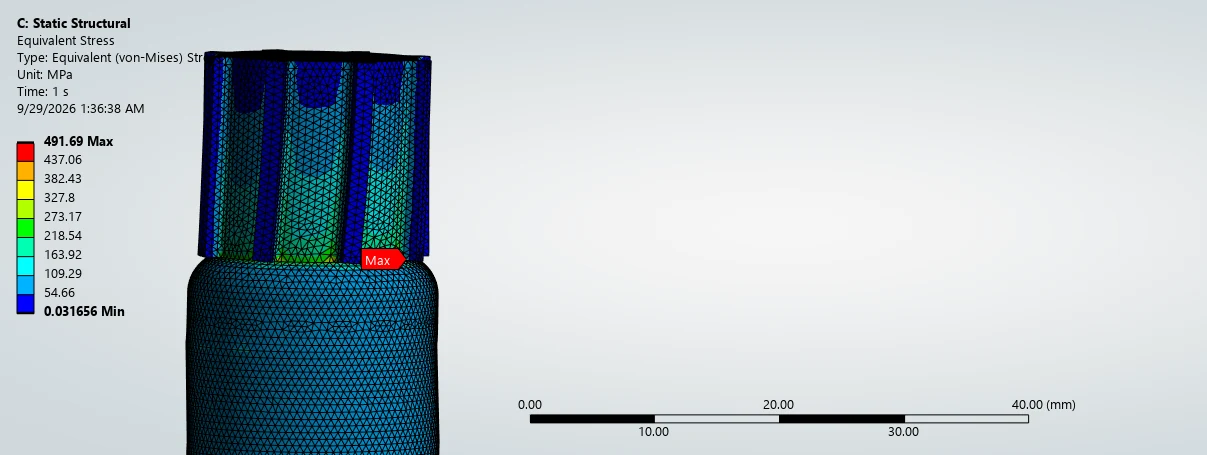 Stress plot with a sharp peak at the spline-end corner of the shaft.